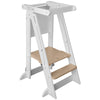 A silhouette picture of the Learn N Fold Learning Tower Toddler Tower in Soft White with Natural Platforms.