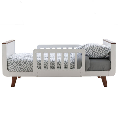 A side silhouette of the MOD Toddler Bed.